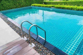 Central Oasis - Entire 3 Bedroom Apartment in Abuja with Pool, Games, WiFi, Balcony, and Garden